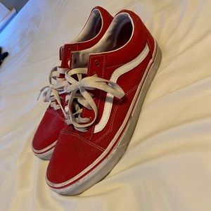 Red vans , with white stripes.